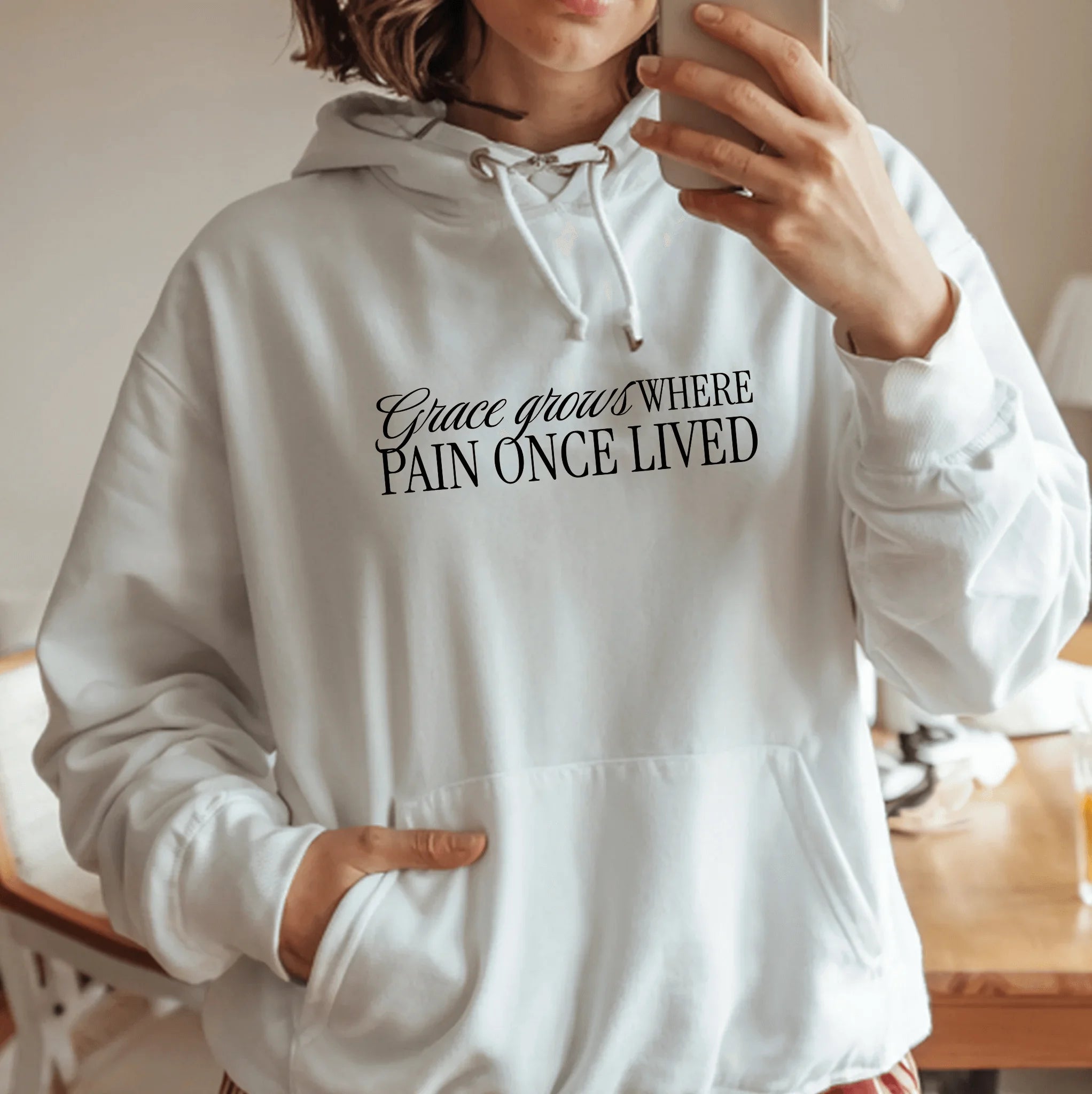 Christian Hoodie – “Grace Grows Where Pain Once Lived” | Faith-Based Unisex Pullover